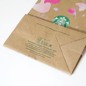 有名コーヒーショップのグラデーションが美しい桜デザインをフルカラー印刷で表現した、春限定オリジナル紙袋